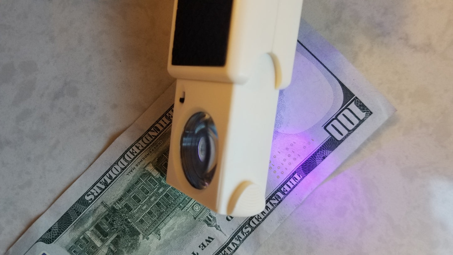 Currency Detector with Light over paper money or cash to check if counterfeit. Use as a Counterfeit Detector Tool, Bill Detector Tool, or Currency Detector Tool. National Supply Company LLC is a North American company. Please visit to buy small Fake Money Detector with Light.